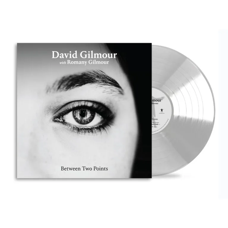 Albumhoes 'Between Two Points' met oog en vinyl.