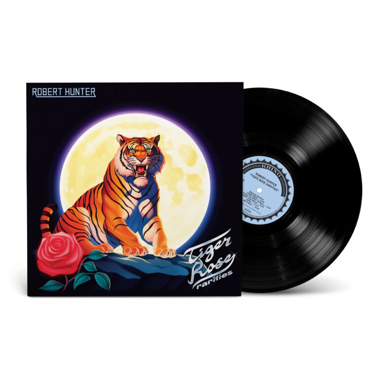 Albumhoes met tijger, maan en roos.